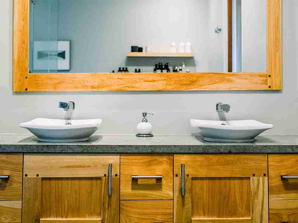 Modern custom double bathroom vanity with wood cabinetry