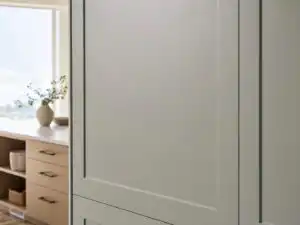 A painted MDF cabinet door, ultra-smooth flat painted surface in soft grey-green, no visible wood grain | Holz Industries, Kelowna