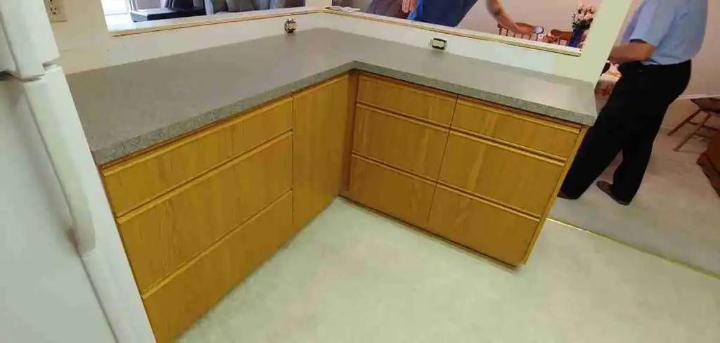 Custom golden oak bathroom vanity with stone countertop